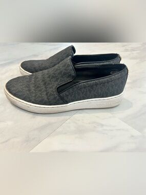 Michael Kors ladies 8 Black Slip-On Sneakers